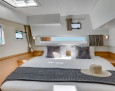 Comfort Class Catamaran – 4 Ensuite Cabins with A/C, Skipper & Host interior, Double cabin