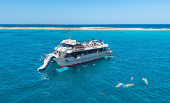 Ibiza Full Day Catamaran Event from Playa d’en Bossa to Cala Jondal