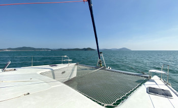 Yoga and Sail Catamaran Cabin Charter North Sardinia